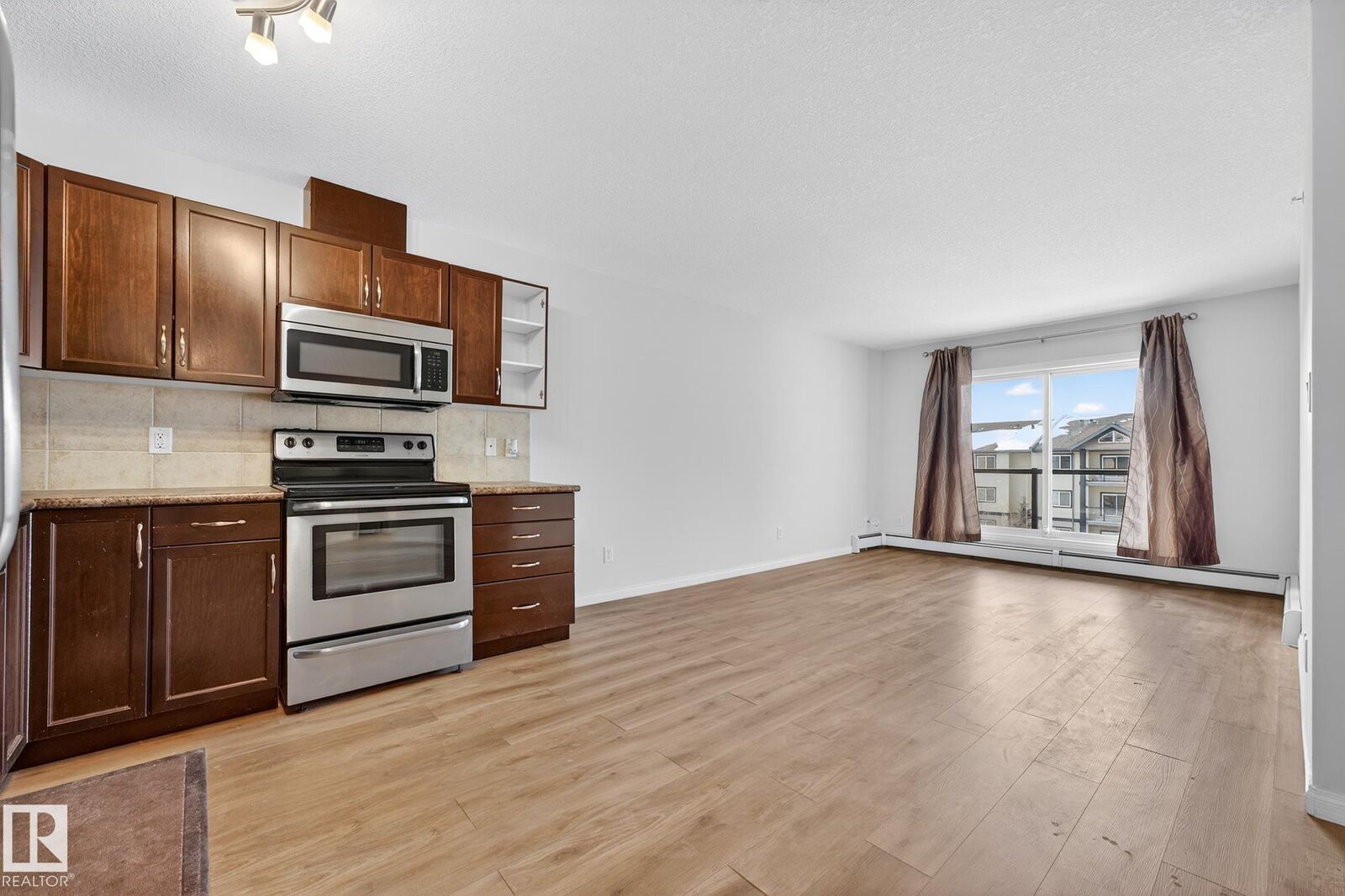 Property Photo:  1204 156 Street NW 416  AB T6R 0R6 