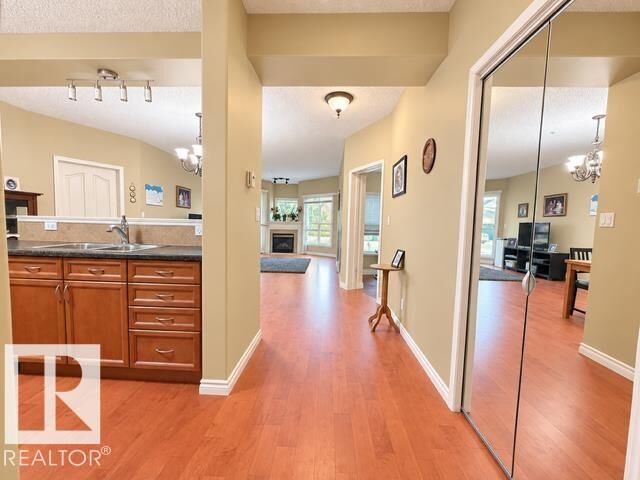 Property Photo:  102A Bridgeport Crossing 102  AB T9E 8K8 