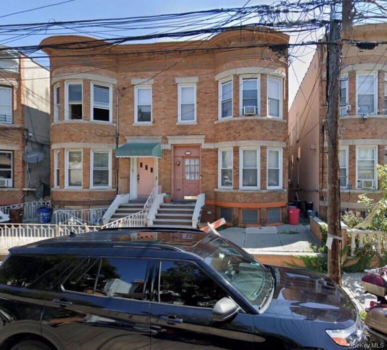 Property Photo:  90-11 77th Street 1  NY 11421 