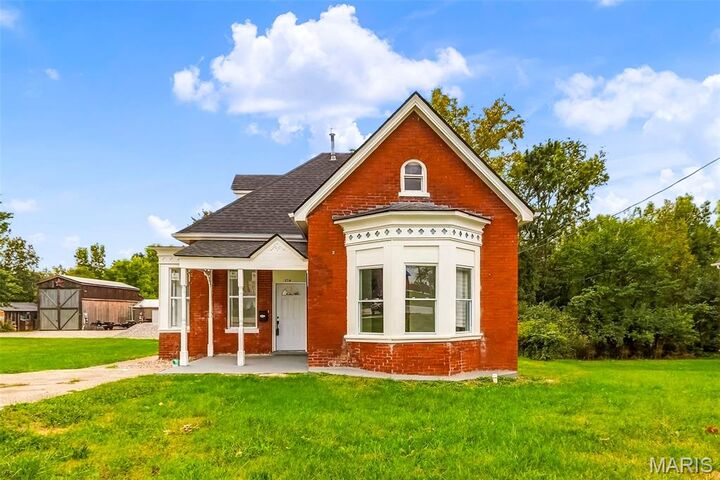 Property Photo:  216 E Walton Street  MO 63383 