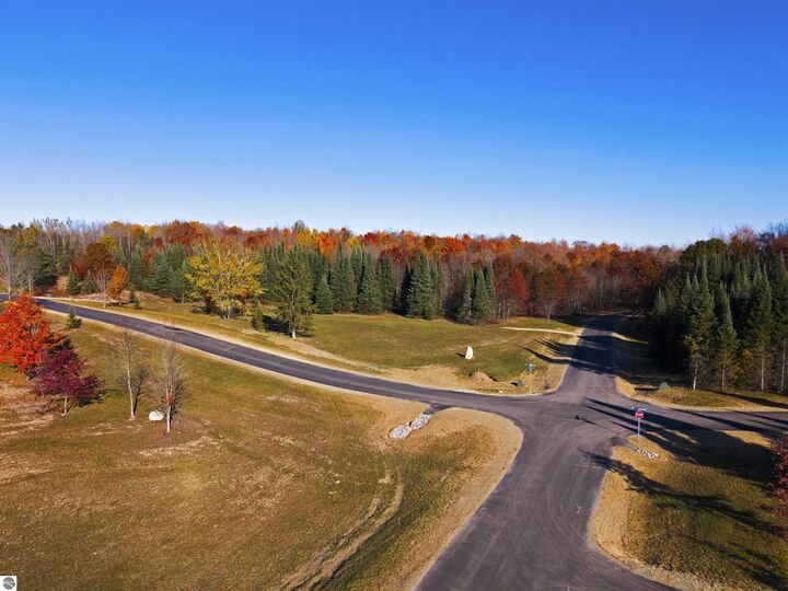 Property Photo:  10825 SW Pine Ridge Drive  MI 49633 
