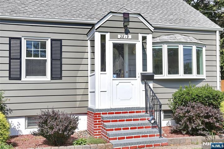 Property Photo:  28-19 Warren Road  NJ 07410 