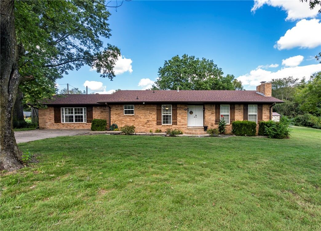 Property Photo:  203 W Raines Road  AR 72761 