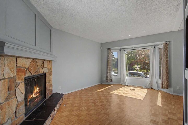 Property Photo:  2444 Woodview Drive SW  AB T2W 4X7 