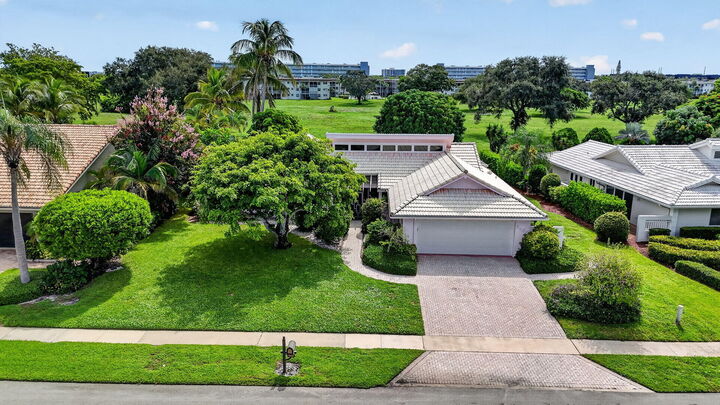 Property Photo:  5680 NW 3rd Terrace  FL 33487 