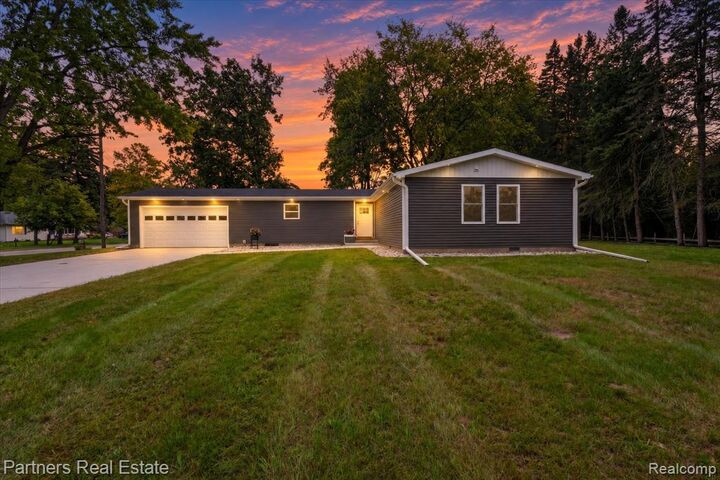 Property Photo: 204 Greenfield Drive MI 48858