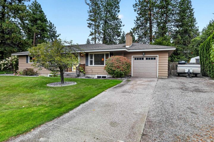 Property Photo: 6920 N Fox Point Dr WA 99208