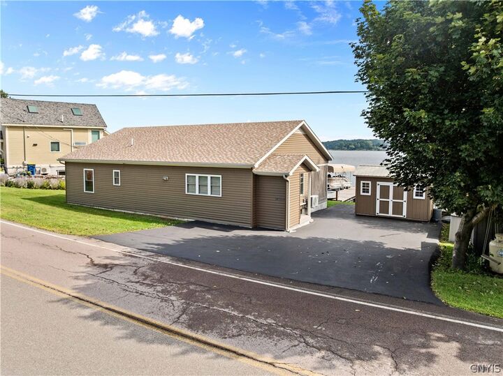 Property Photo:  14900 W Bay Road  NY 13156 
