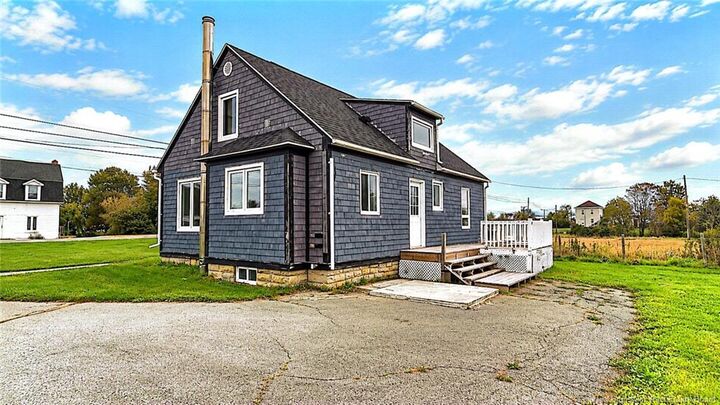 Property Photo:  275 Rue Acadie  NB E8N 1B9 