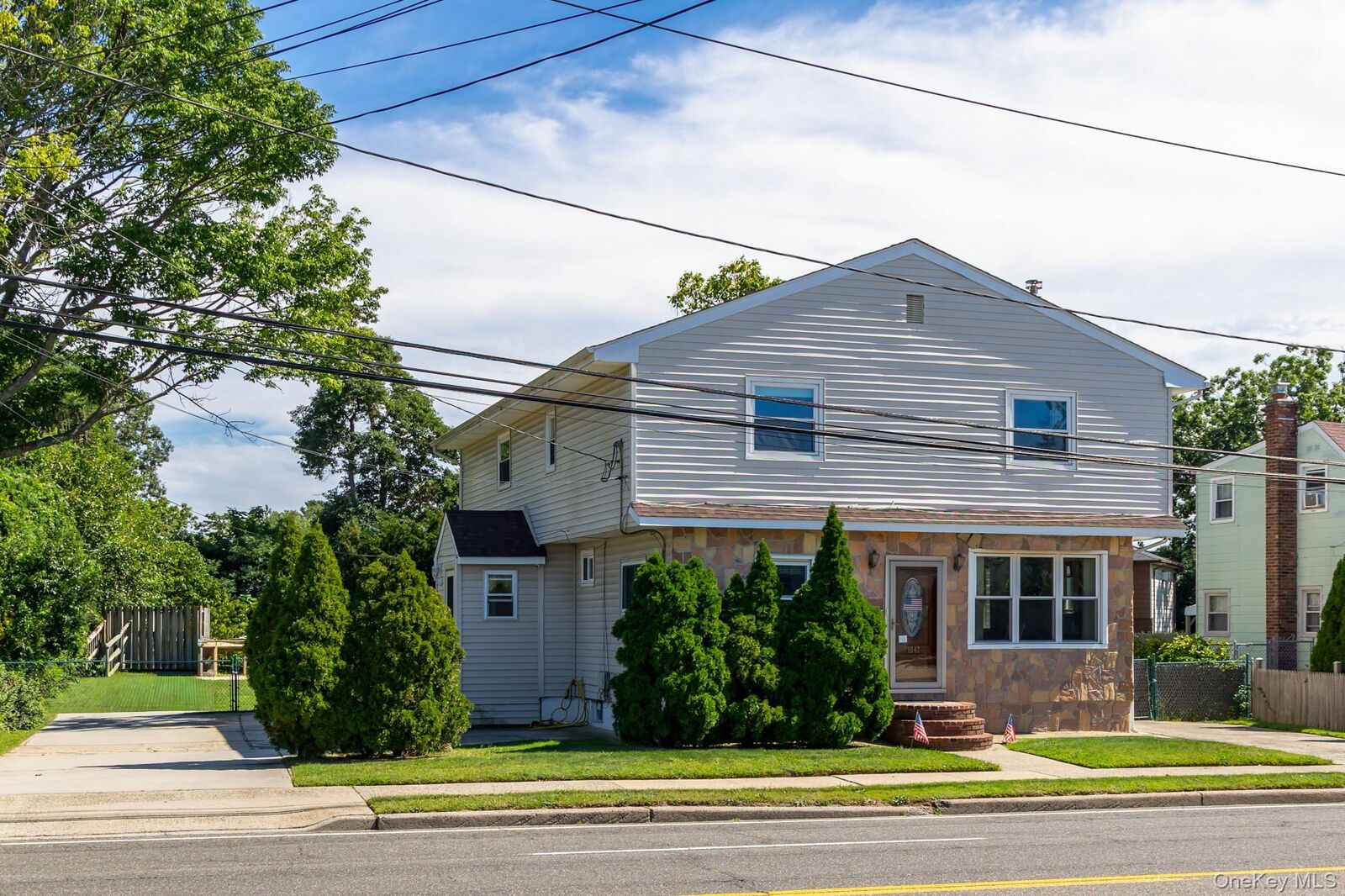 Property Photo:  1647 Straight Path  NY 11757 