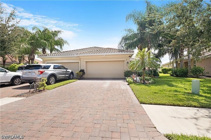 Property Photo: 2034 Tamarron Lane FL 34120