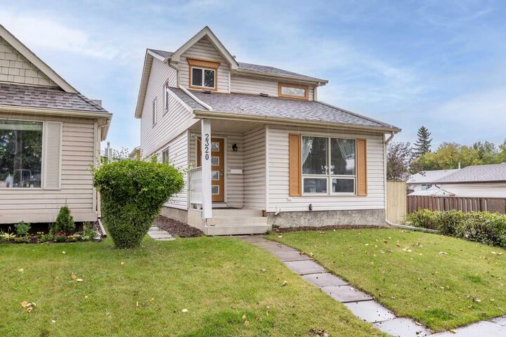 Property Photo: 2320 Woodview Drive SW AB T2W 4X6