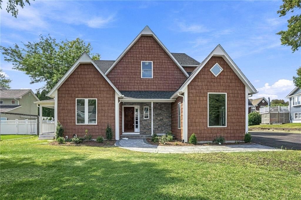 Property Photo:  127 Woodbine Avenue  RI 02886 