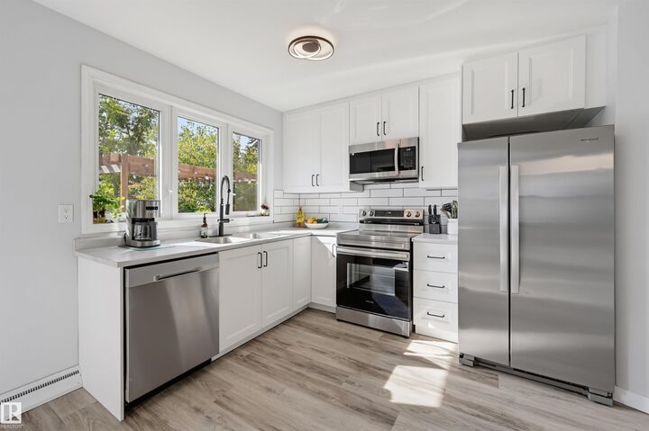 Property Photo:  13655 122 Avenue NW  AB T5L 2W1 