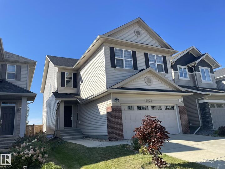 Property Photo:  7939 Erasmus Crescent NW  AB T6M 0S2 