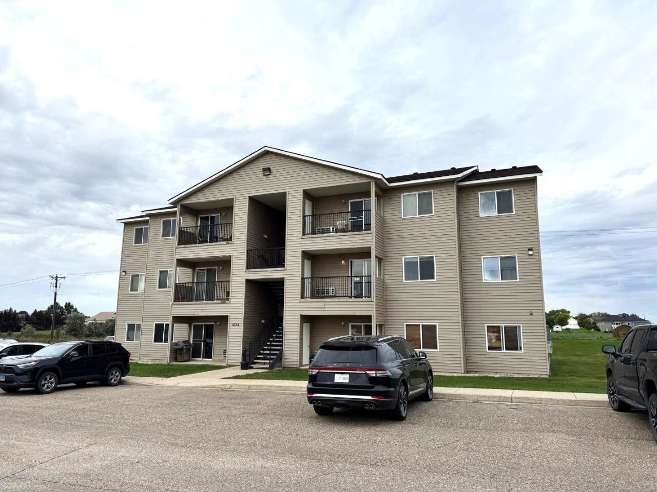 Property Photo:  1624 20th Ave Unit #102 NW  ND 58703 