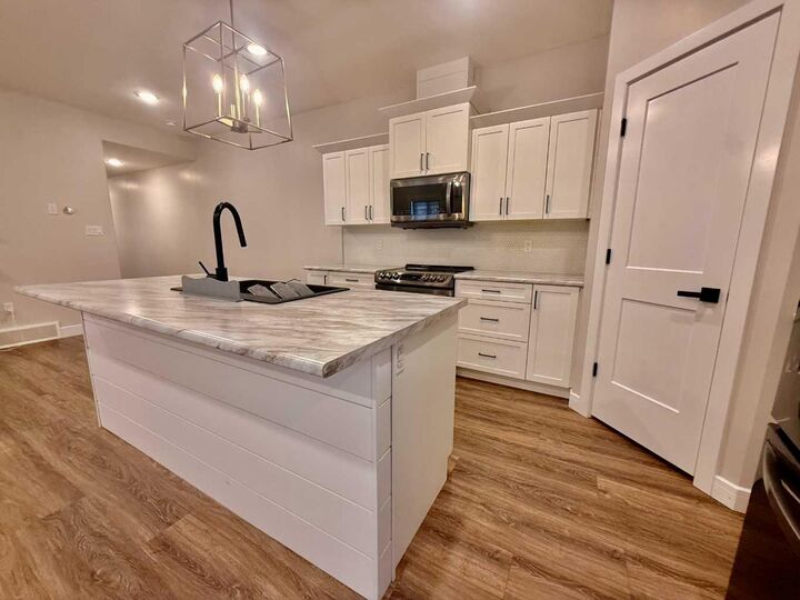 Property Photo:  707 9 Avenue  AB T9W 1P2 