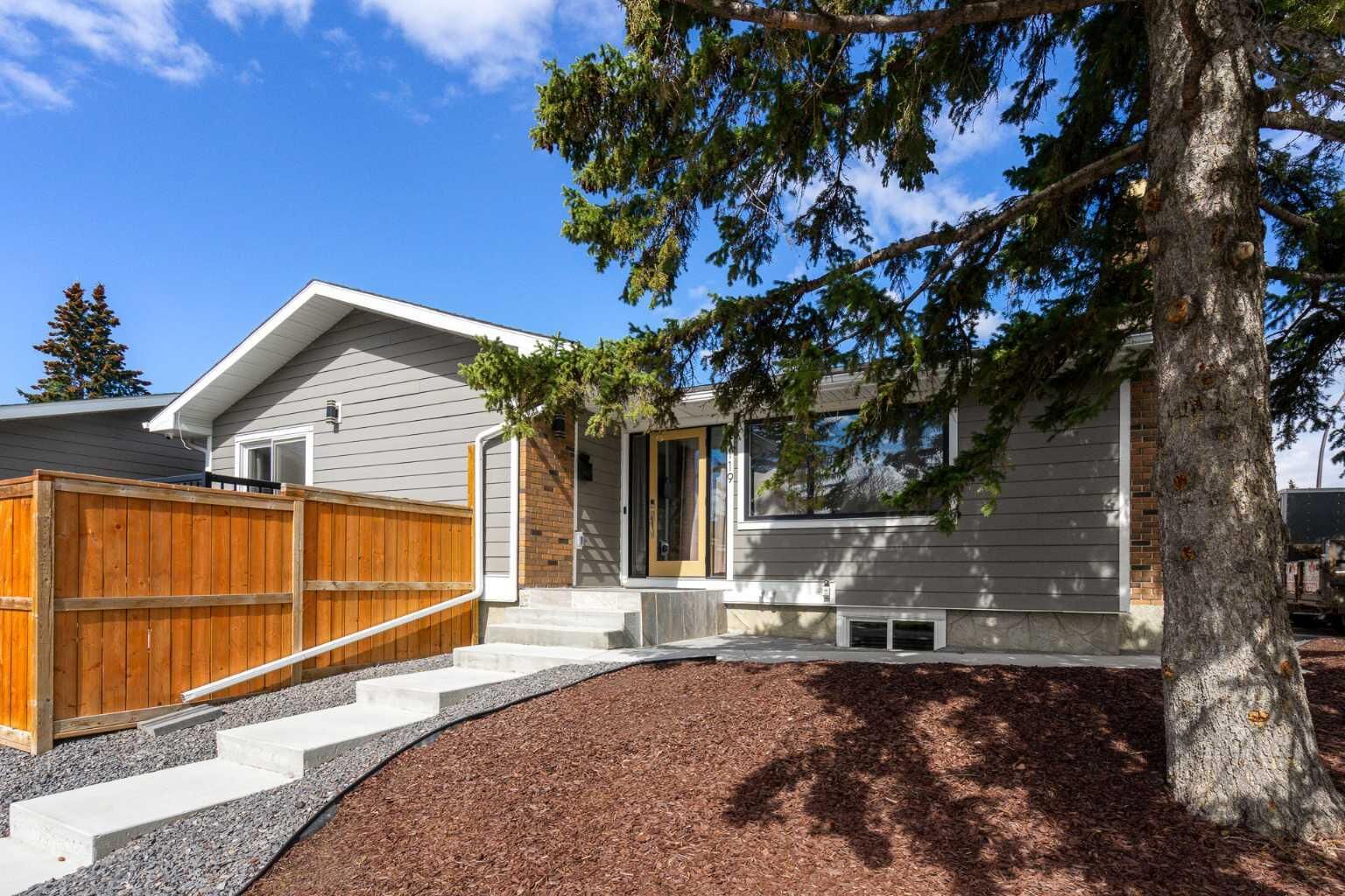 Property Photo: 119 Silvercreek Close NW AB T3B 4G2