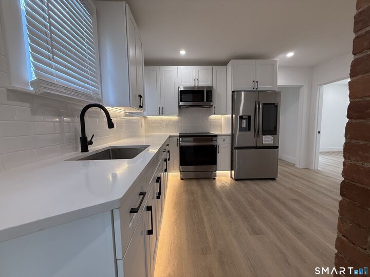 Property Photo: 21-23 Elliott Street 3 CT 06114