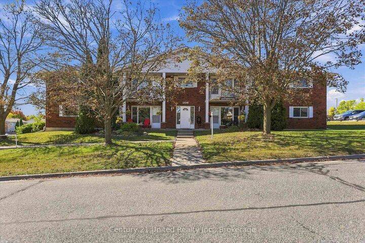Property Photo: 2406 Mountland Drive 202 ON K9K 2E1