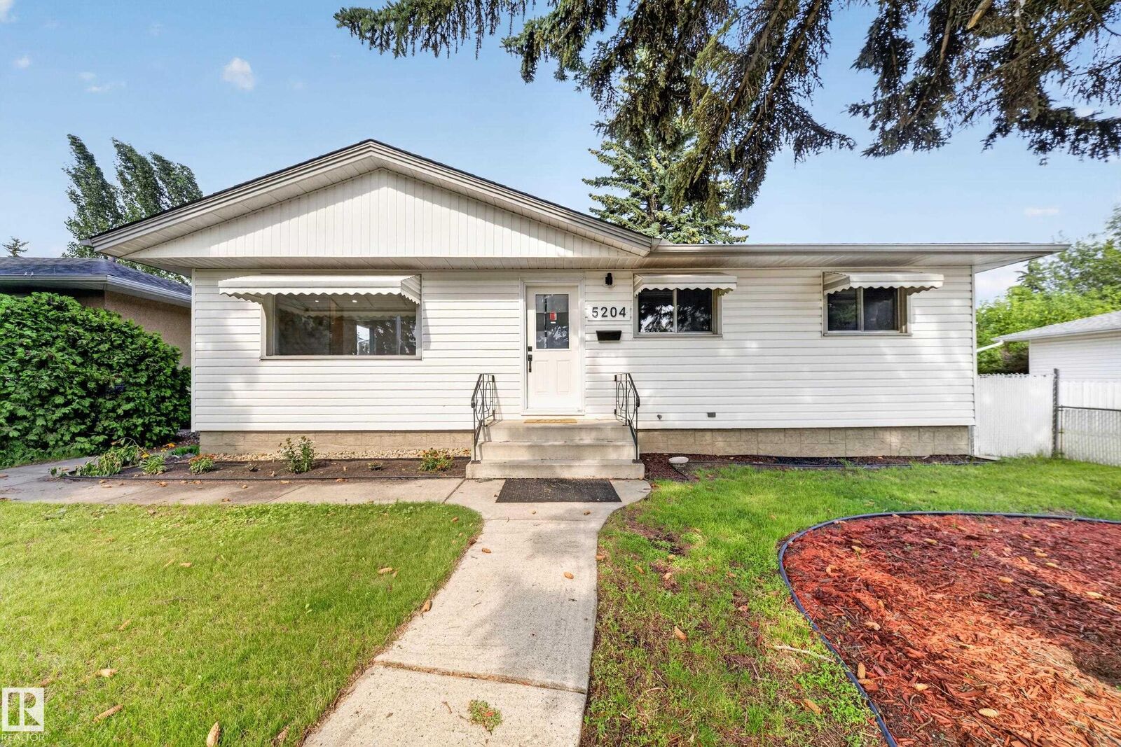 Property Photo: 5204 97A Avenue NW AB T6B 1E1