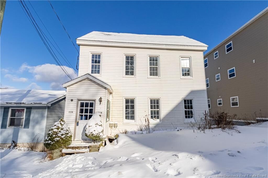 Property Photo: 226-228 Watson Street NB E2M 1G8