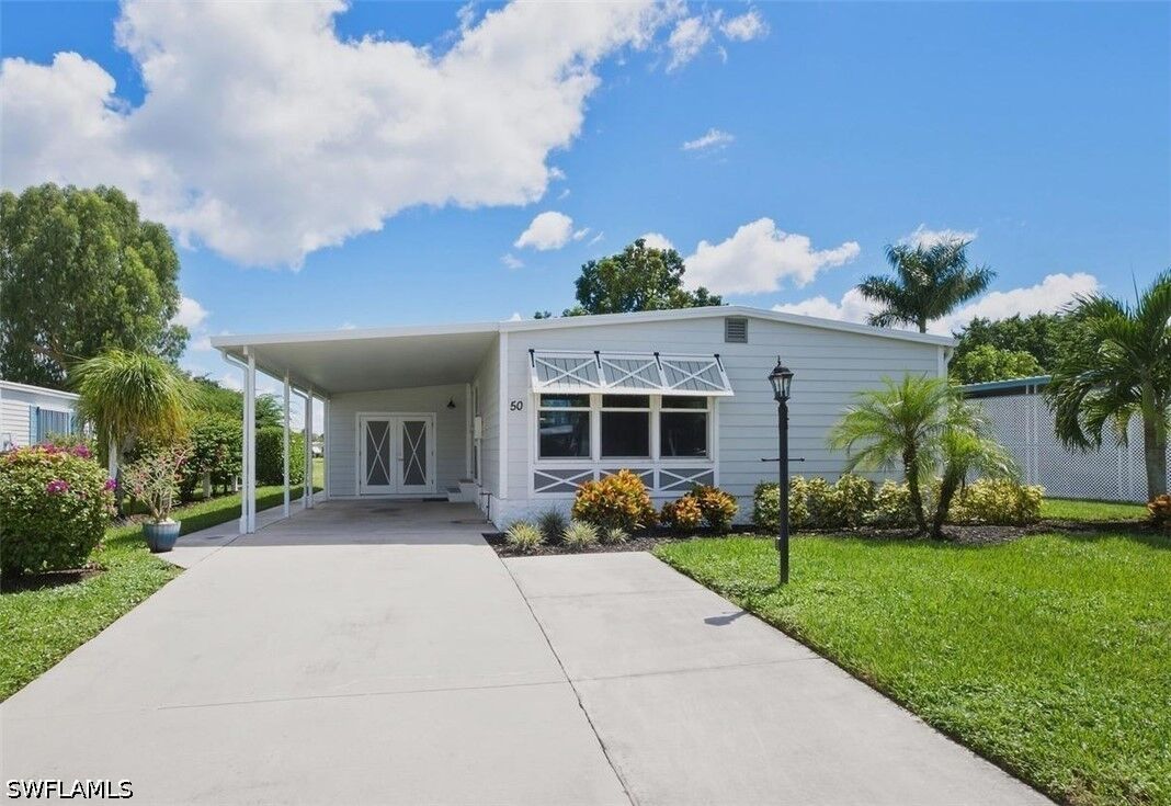 Property Photo:  50 Le Mans Drive  FL 34112 