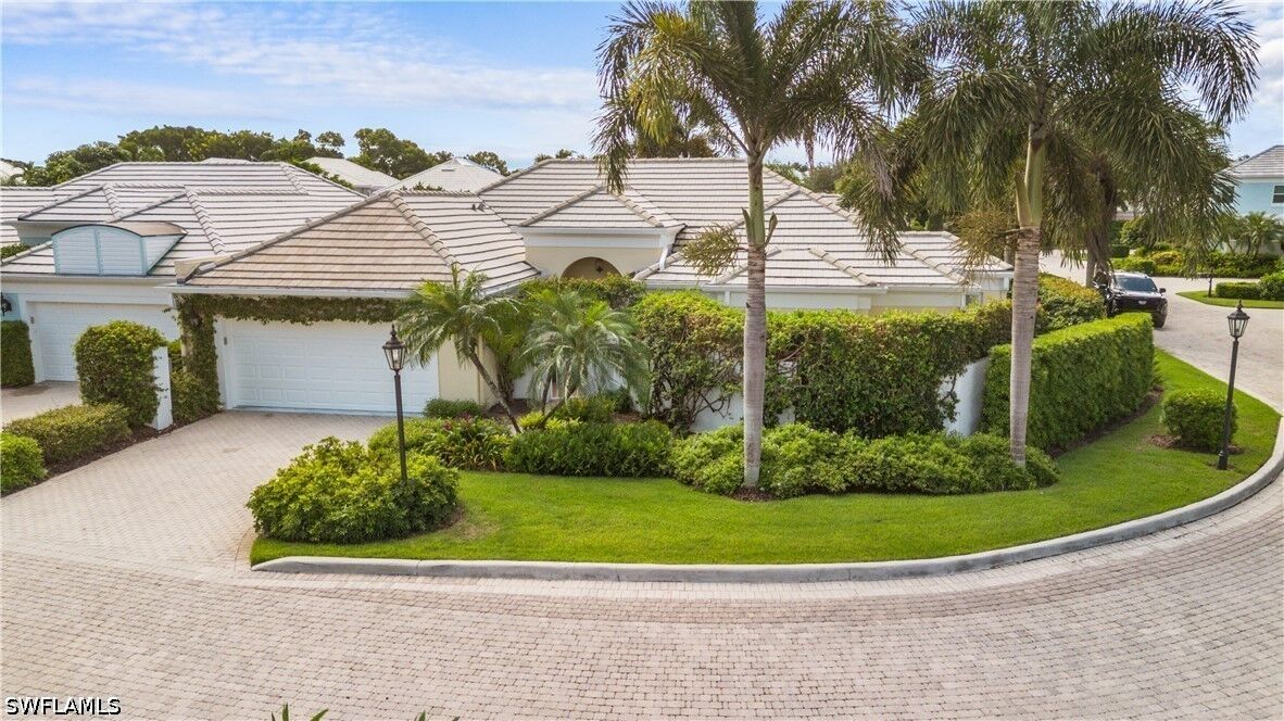 Property Photo:  807 Rue Deville 2.11  FL 34108 