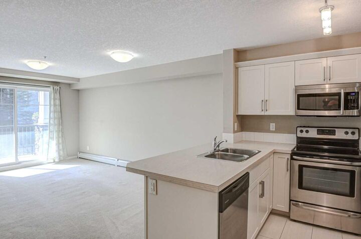 Property Photo:  130 Panatella Street NW 2217  AB T3K 0Y6 