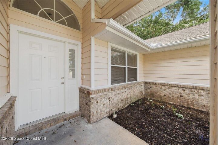 Property Photo: 721 Samuel Chase Lane FL 32904