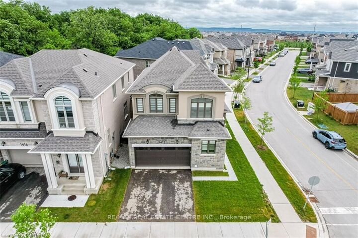 Photo de la propriété:  1412 Rose Way Bsmt.  ON L9T 7E7 