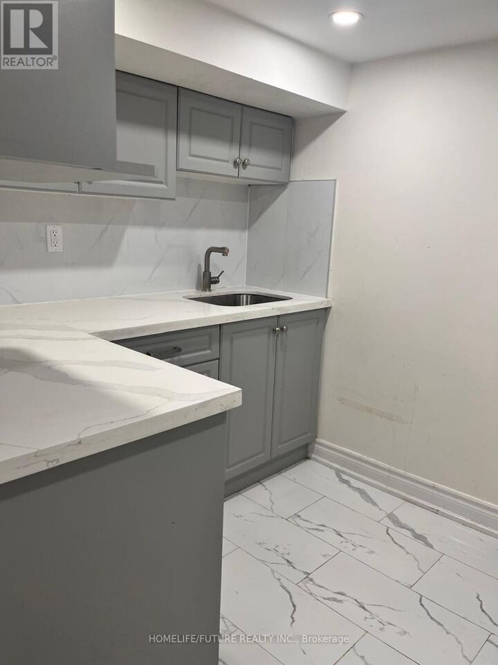 Property Photo:  229 Flora Drive Bsmt  ON M1P 1B2 