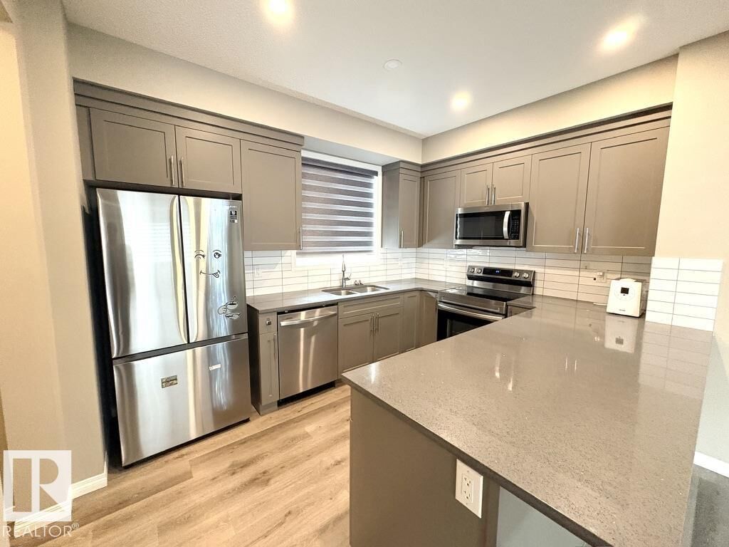Property Photo:  2072 Wonnacott Way SW 30  AB T6X 2V7 