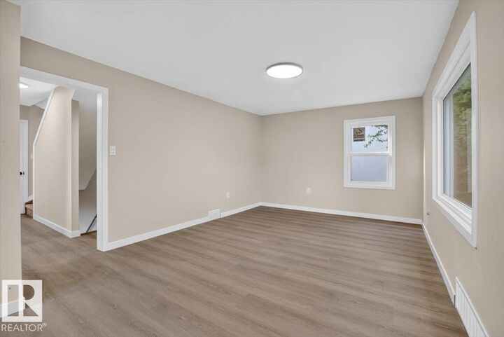Property Photo:  11645 90 Street NW  AB T5B 3Y3 