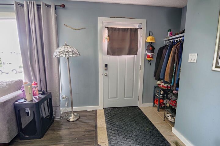Property Photo:  32 Lemoyne Crescent W  AB T1K 4A5 