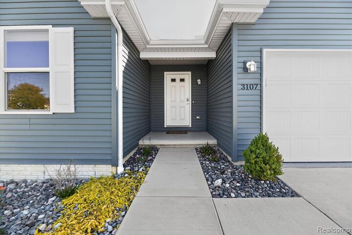Property Photo:  3107 Daisy Way  MI 48519 