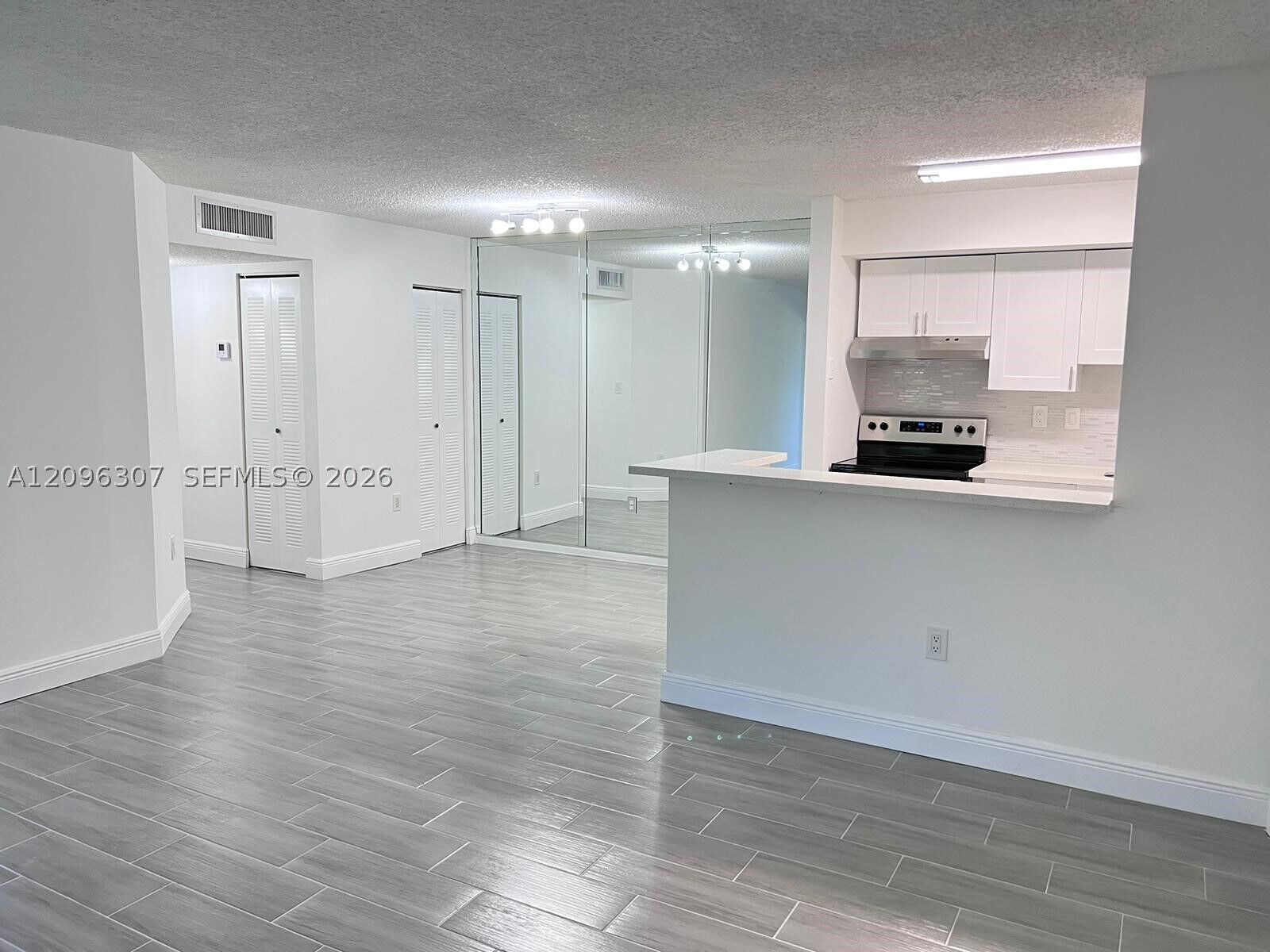 Property Photo:  19055 NW 62nd Ave 111  FL 33015 