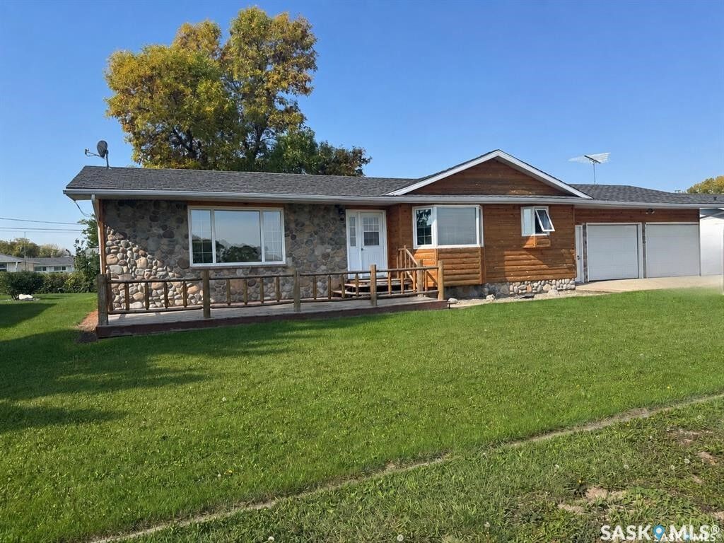 Property Photo:  203 Macdonald Street  SK S0A 3Y0 