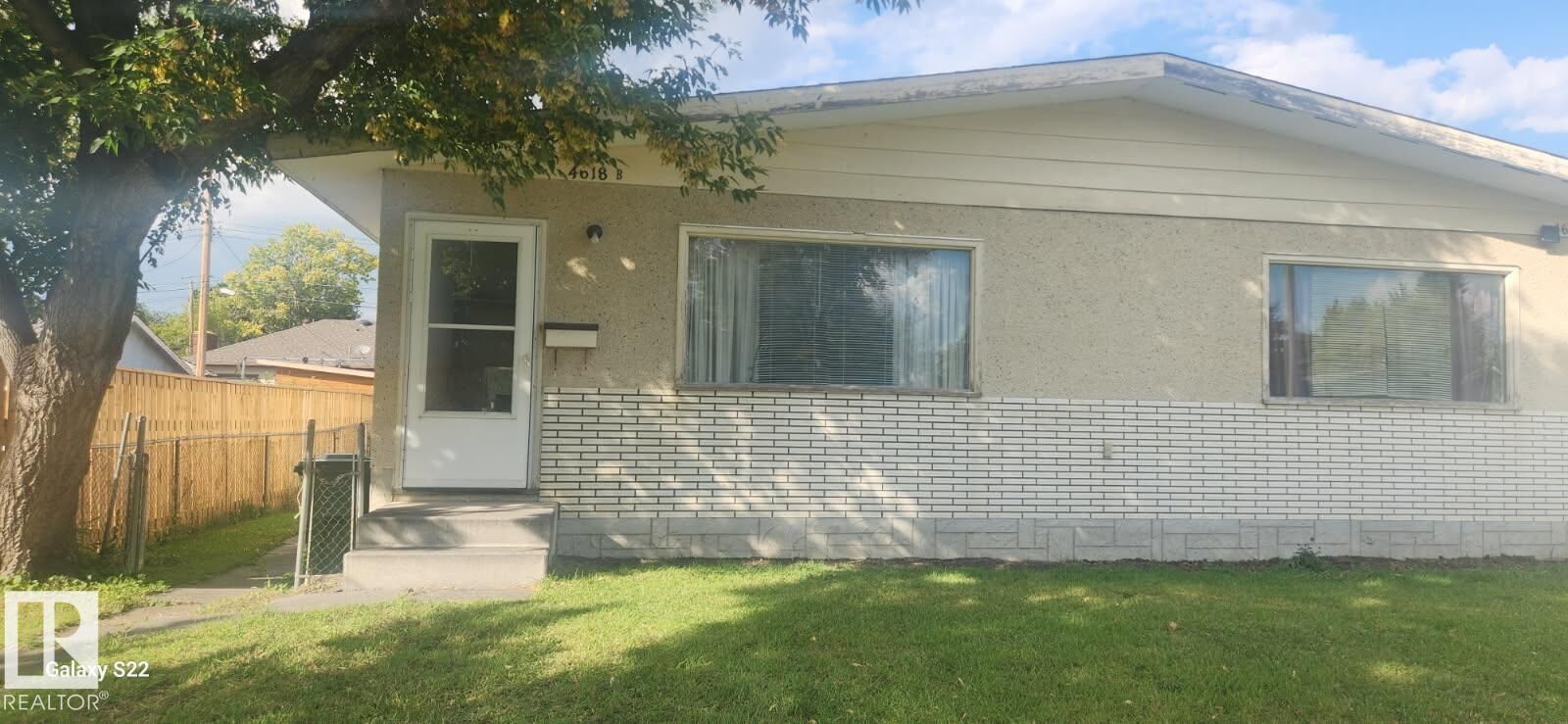 Property Photo:  4618B 45 Avenue  AB T9A 1Z7 