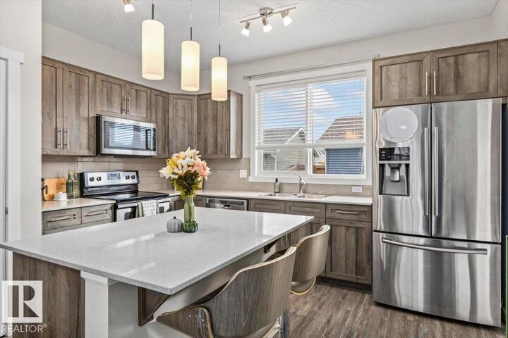 Property Photo: 2675 Maple Way NW AB T6T 2C8