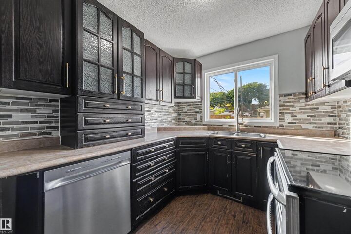 Property Photo:  12944 117 Street NW  AB T5E 5J7 