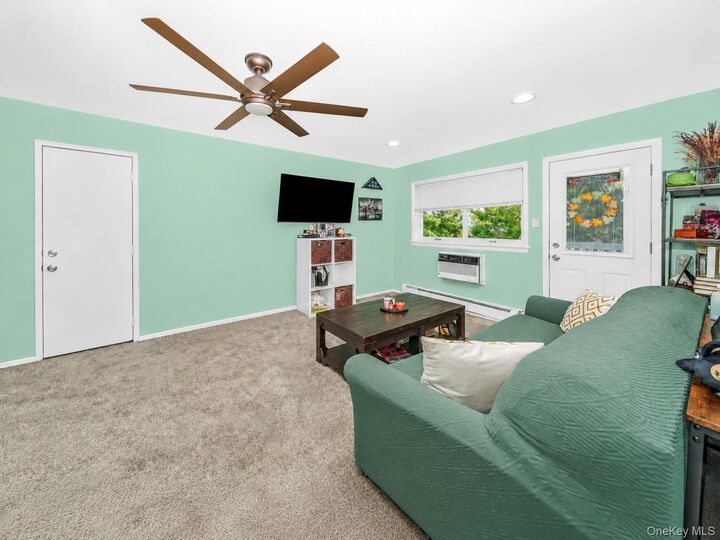 Property Photo:  61 Adams 2A  NY 11722 