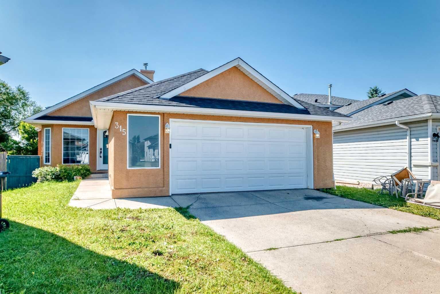 Property Photo:  315 Appleglen Place SE  AB T2A 7V9 