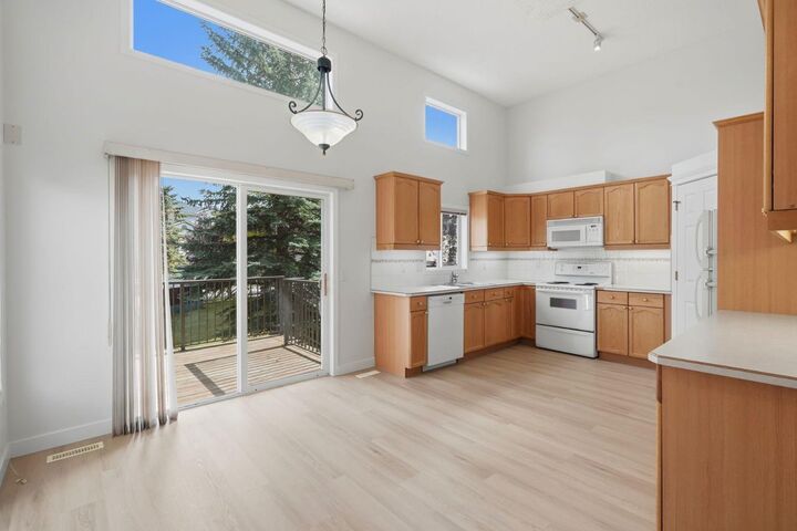 Property Photo: 23 Country Hills Cove NW AB T3K 5G7