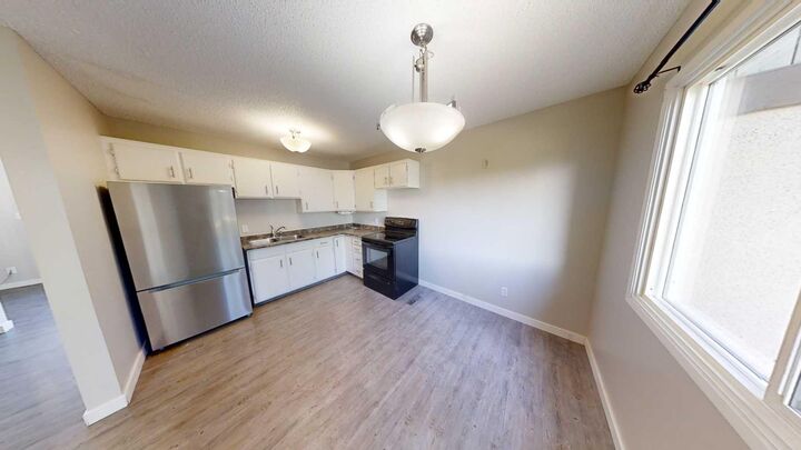 Property Photo:  7852 Cedarwood Park  AB T8V 4R8 