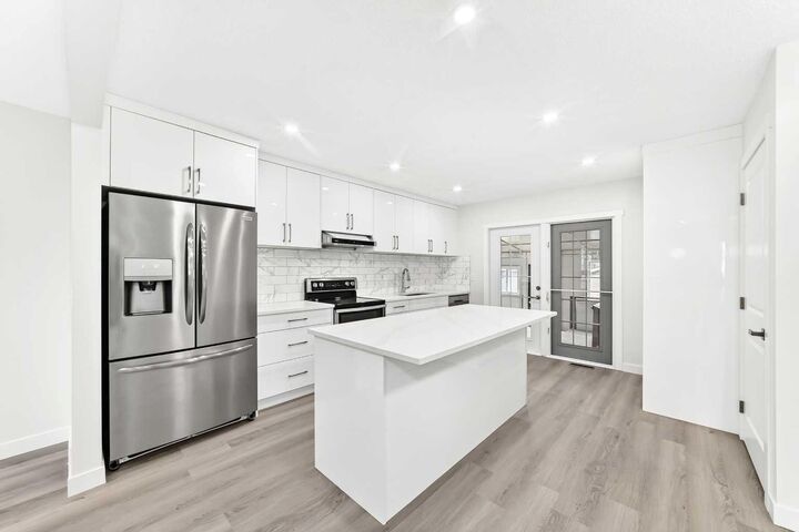 Property Photo: 3319 Radcliffe Drive SE AB T2A 5X3