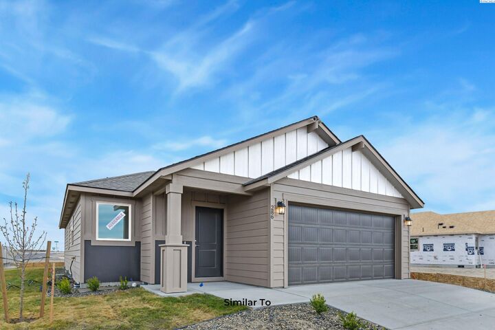 Property Photo:  751 Honeylicious St  WA 99352 