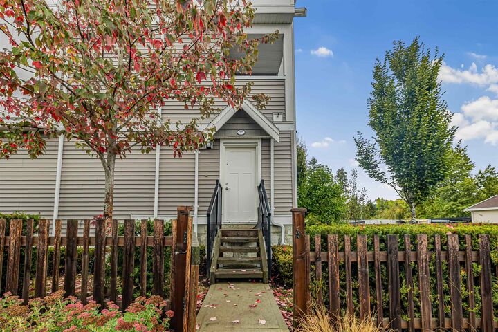 Property Photo: 8033 166B Street 20 BC V4N 6G7