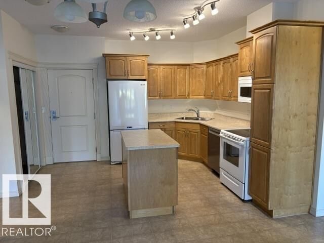 Property Photo: 9820 165 Street NW 325 AB T5P 0N3