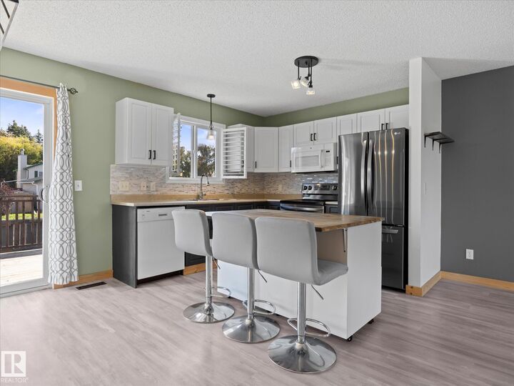 Property Photo:  21 Spruce Meadow Lane  AB T0A 0K0 